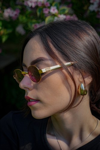 MIU MIU MU B51S - 7OE30Y - 47 Lunettes de soleil Bronze Ovale