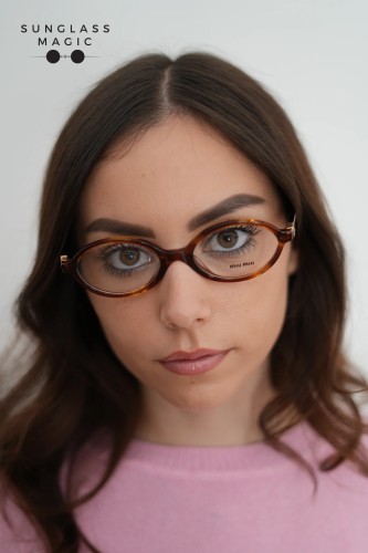 MIU MIU MU 01XV - 26E1O1 - 50 Cadres optiques Rayé tabac Ovale