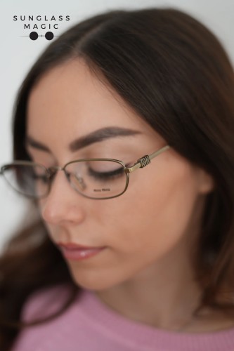 MIU MIU MU 52ZV - 26C1O1 - 53 Cadres optiques Vieux or Irrégulier